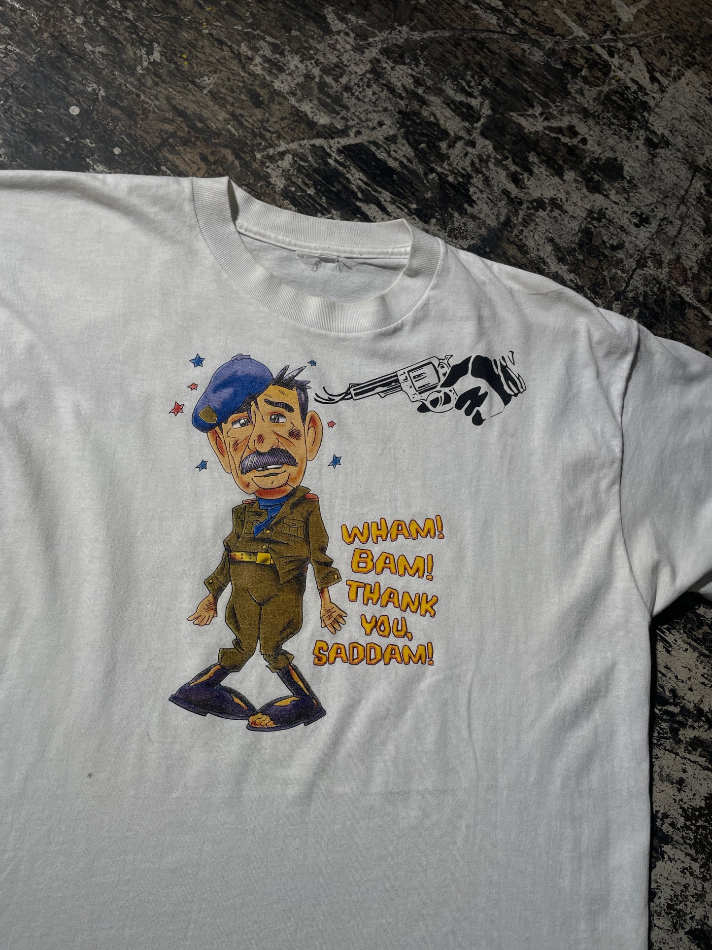 (L) Saddam